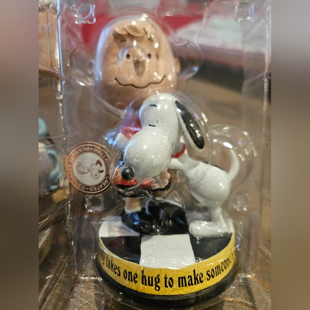 Hallmark Peanuts Snoopy and Charlie Brown Figurine